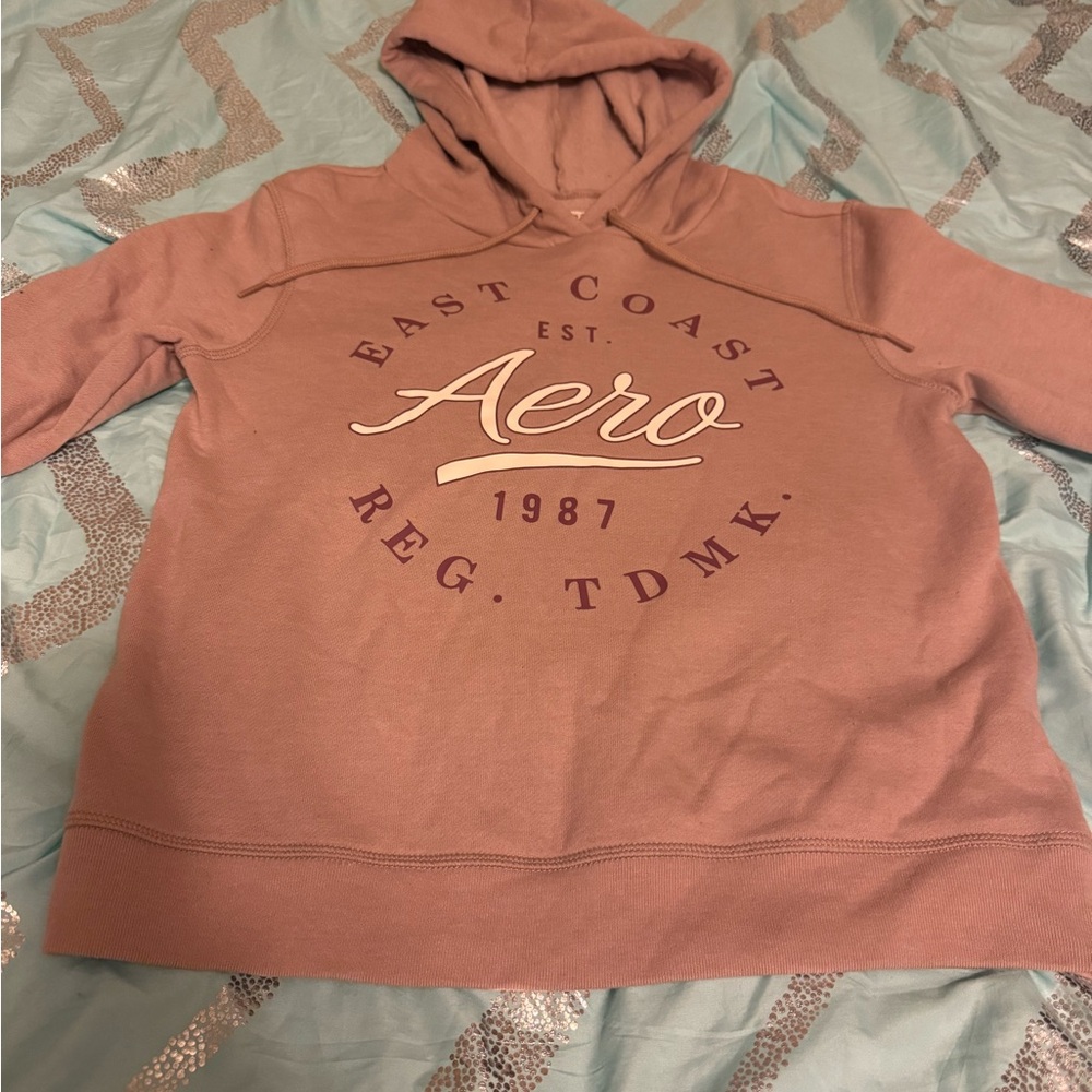 Women’s Aeropostale tan hoodie with maroon and cream logo and writing, size XS